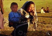 Little girl with a baby